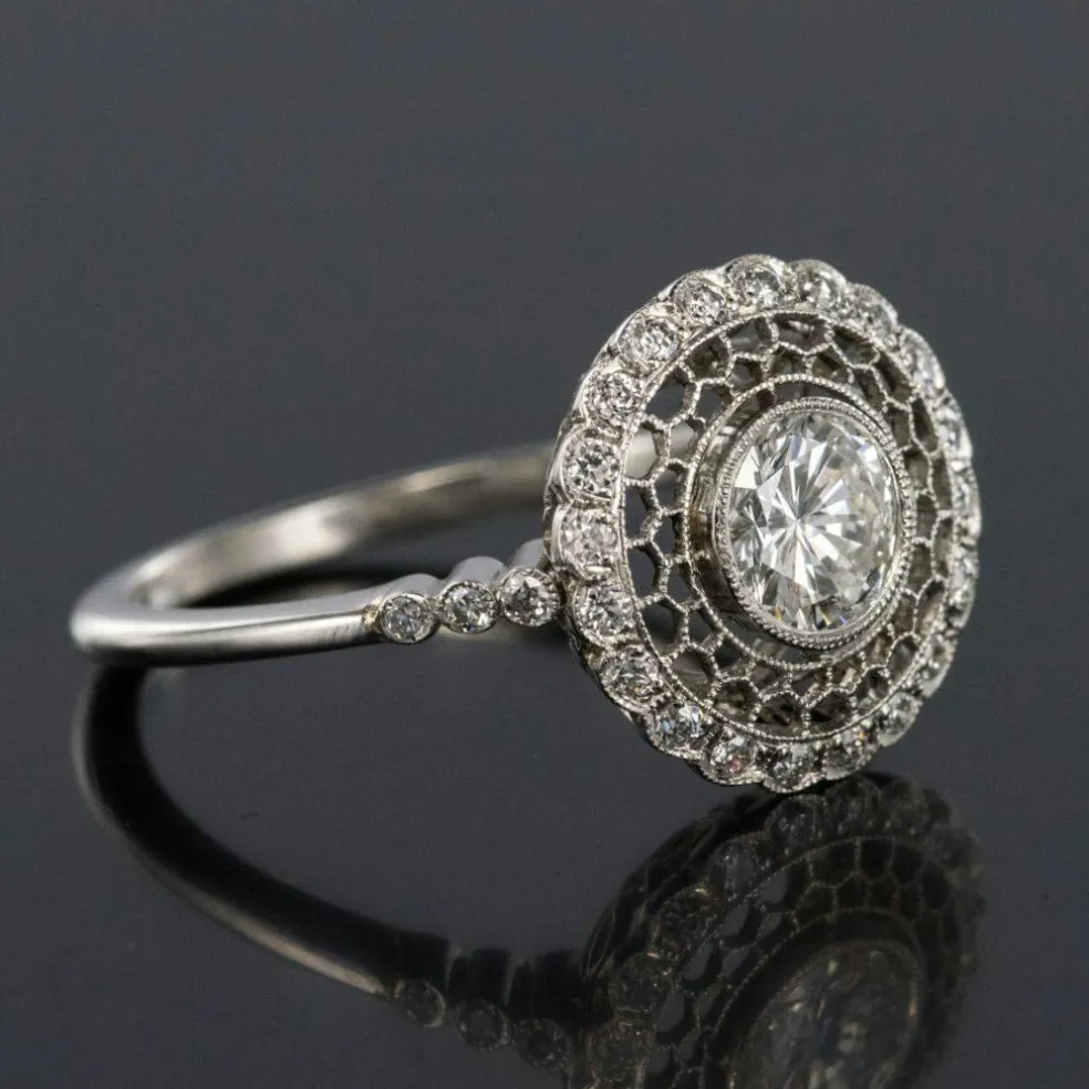 Bague ronde dentelle de platine et diamants