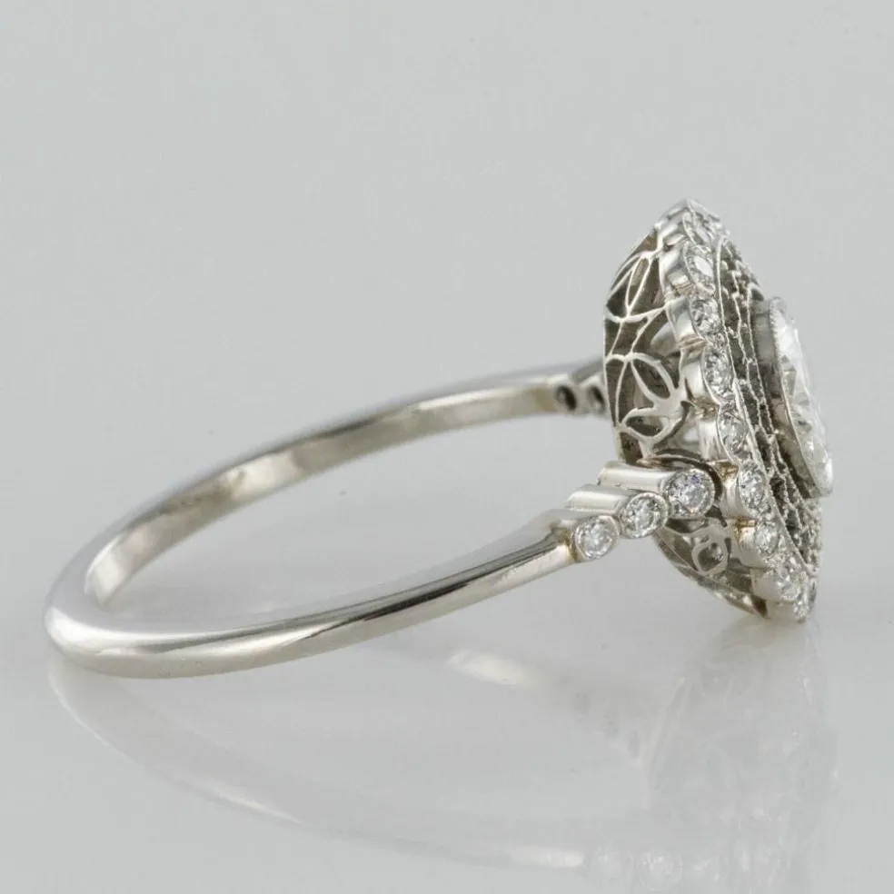 Bague ronde dentelle de platine et diamants