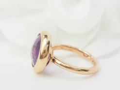 Bague ronde en or rose et améthyste façettée