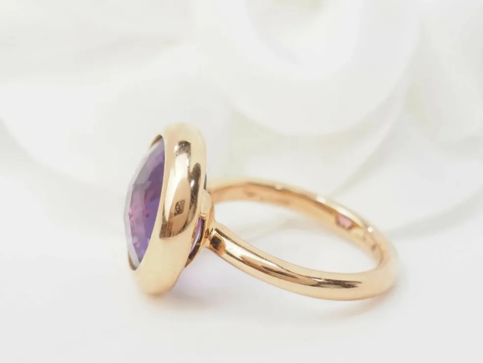 Bague ronde en or rose et améthyste façettée