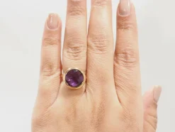 Bague ronde en or rose et améthyste façettée