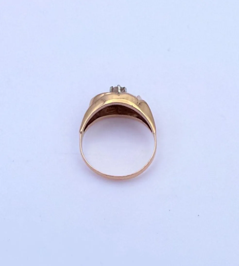 Bague rétro or jaune sertie d'un diamant