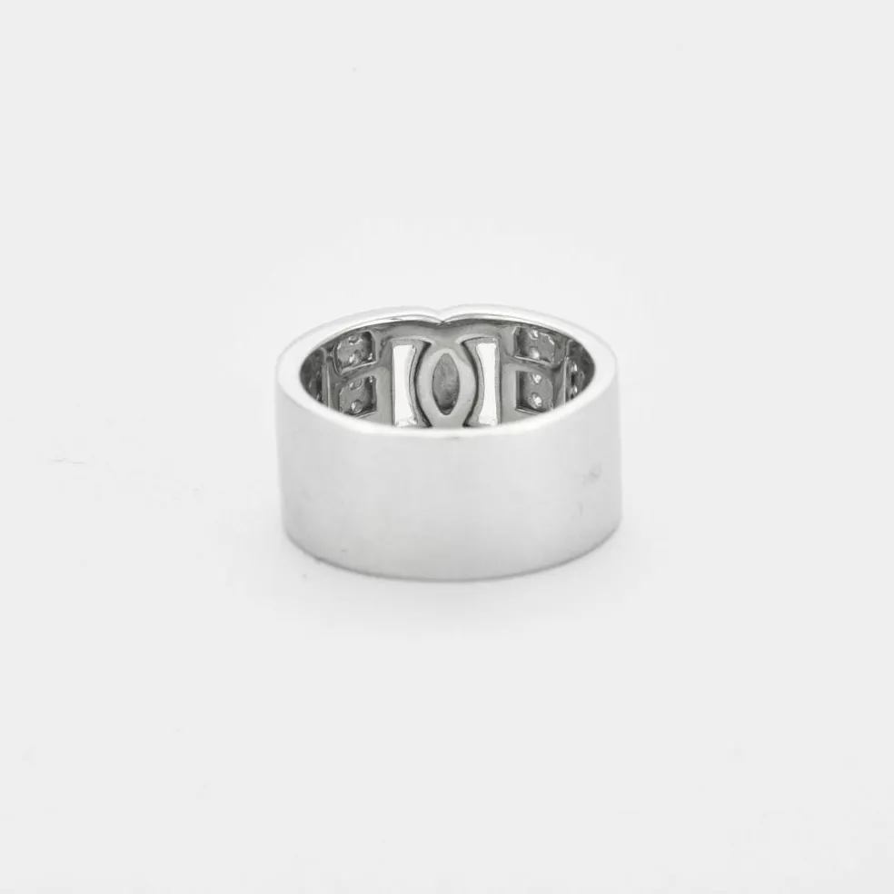 Bague ruban or blanc pavage diamants