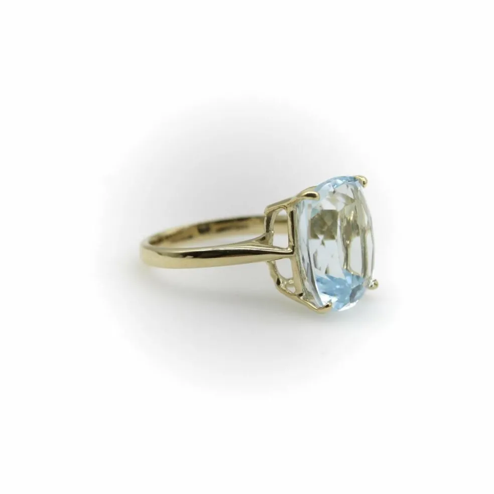 Bague Signature en or 14 carats et topaze bleu clair 6 carats