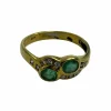 Bague sinueuse avec émeraudes et diamants