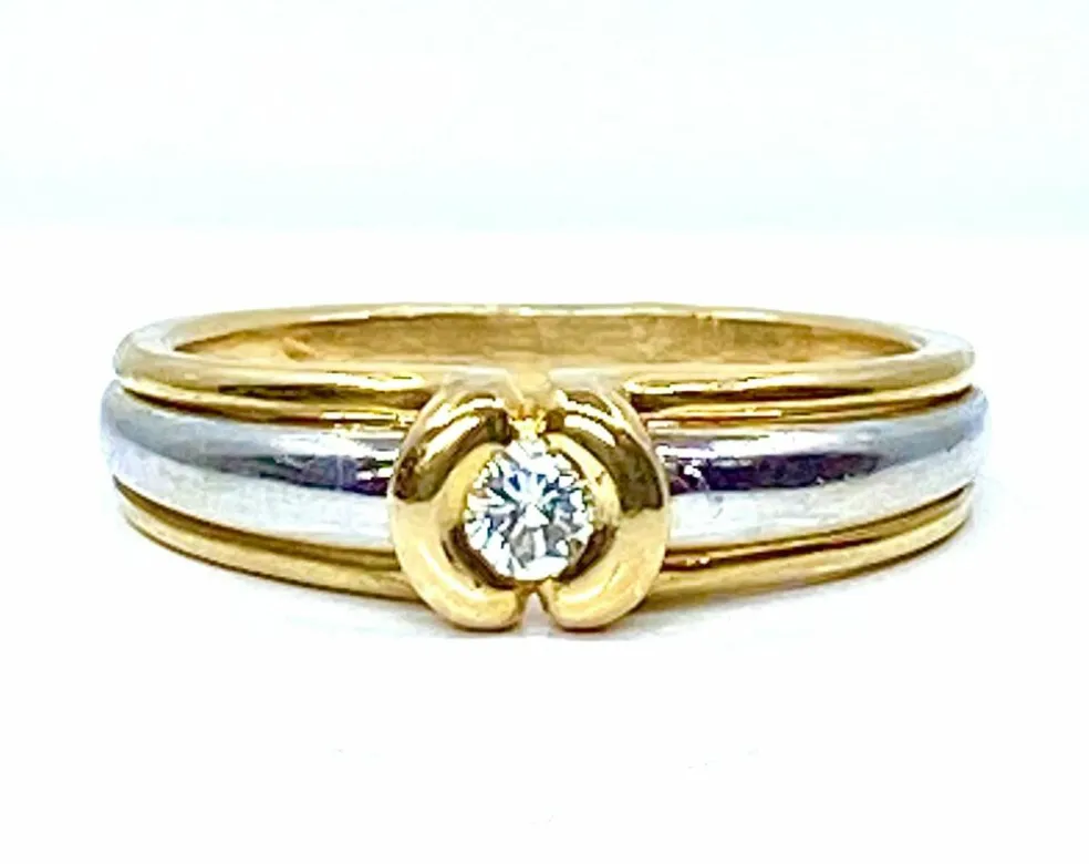 Bague solitaire 2 ors 18 carats et diamants