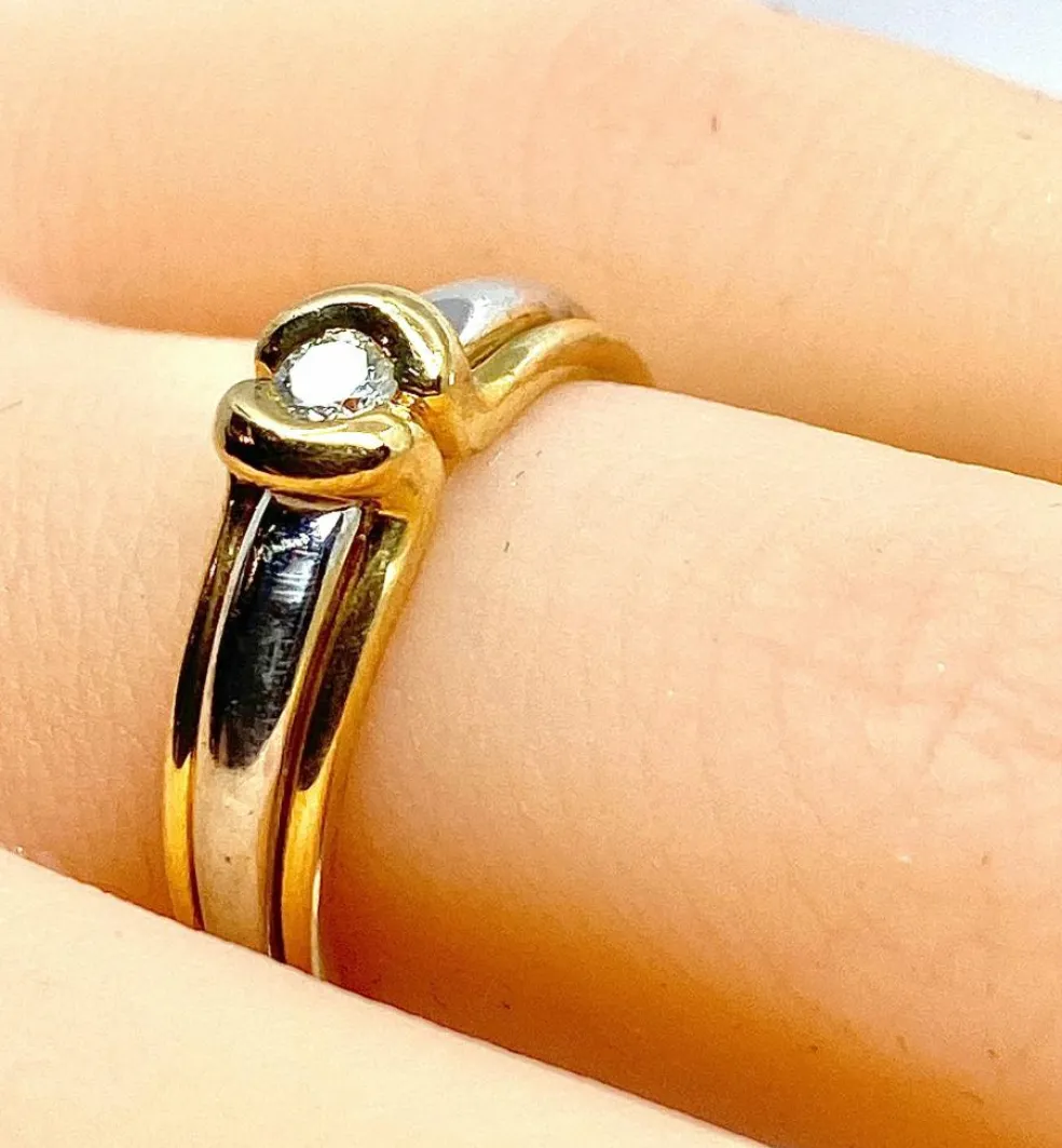 Bague solitaire 2 ors 18 carats et diamants