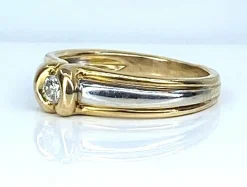 Bague solitaire 2 ors 18 carats et diamants