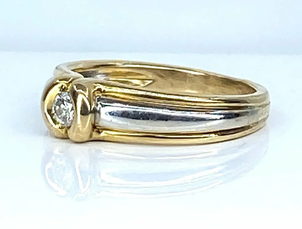 Bague solitaire 2 ors 18 carats et diamants