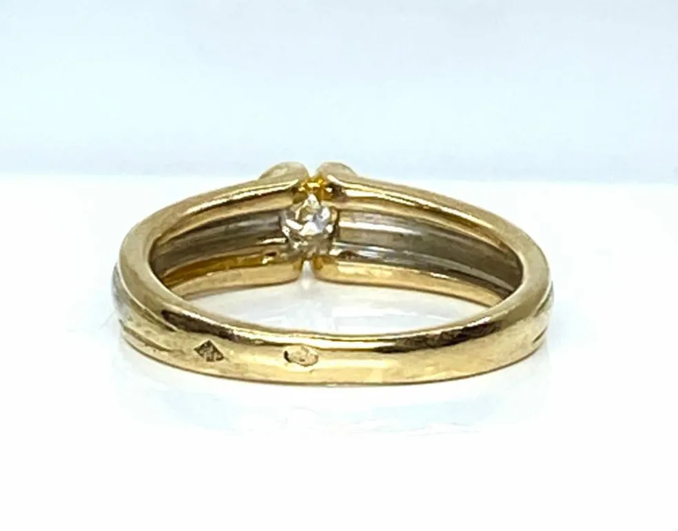 Bague solitaire 2 ors 18 carats et diamants