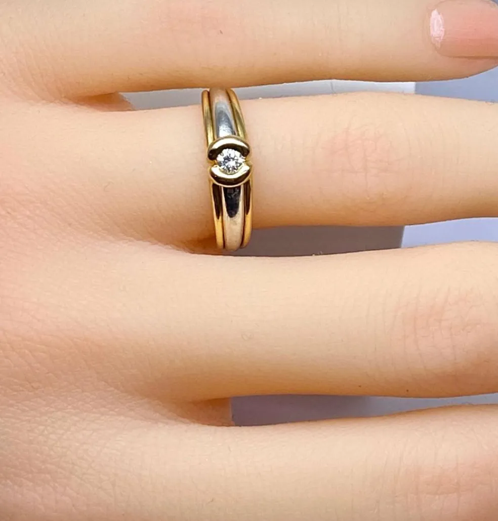 Bague solitaire 2 ors 18 carats et diamants