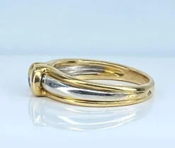 Bague solitaire 2 ors 18 carats et diamants