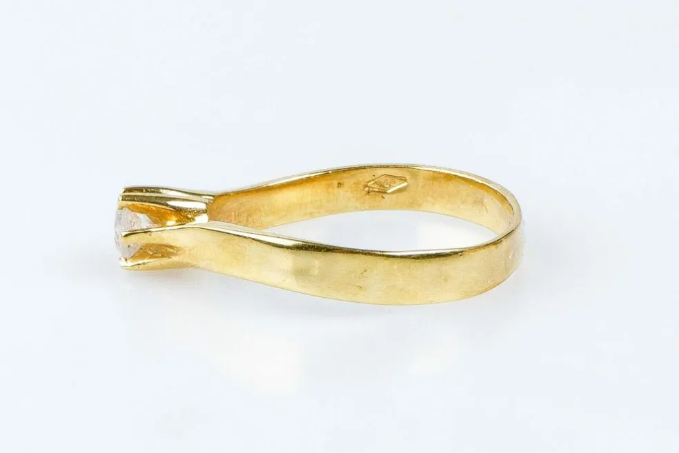 Bague solitaire 0.18ct en or massif