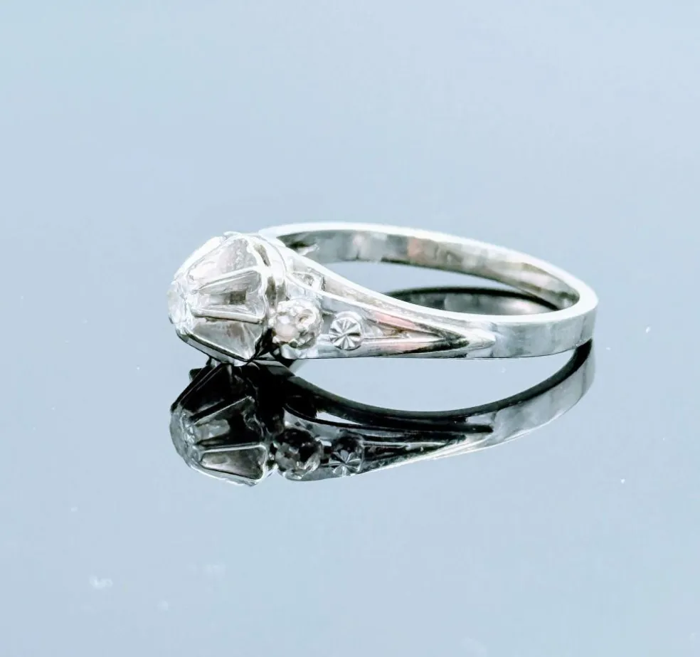 Bague solitaire diamant vintage en or gris 18K