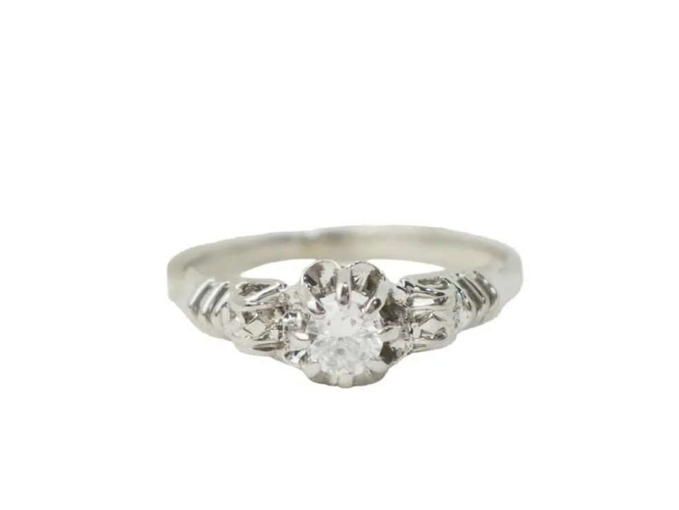 Bague solitaire en or blanc et platine, diamant 0,23ct