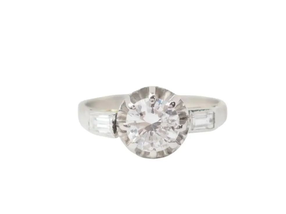 Bague solitaire en or blanc et diamant