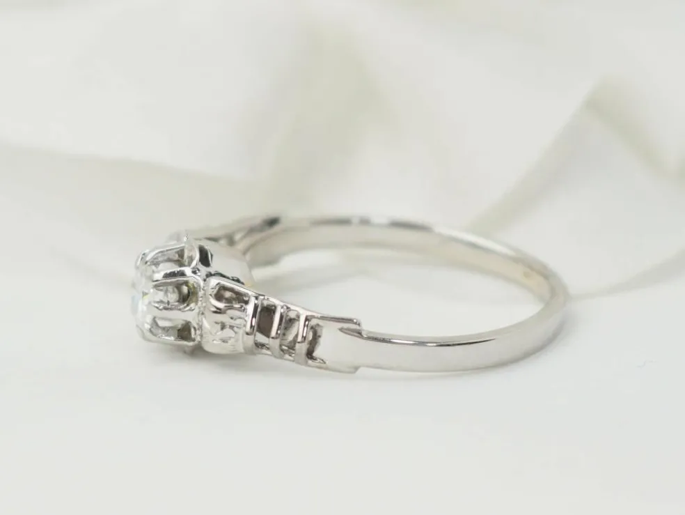 Bague solitaire en or blanc et platine, diamant 0,23ct