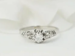 Bague solitaire en or blanc et platine, diamant 0,23ct