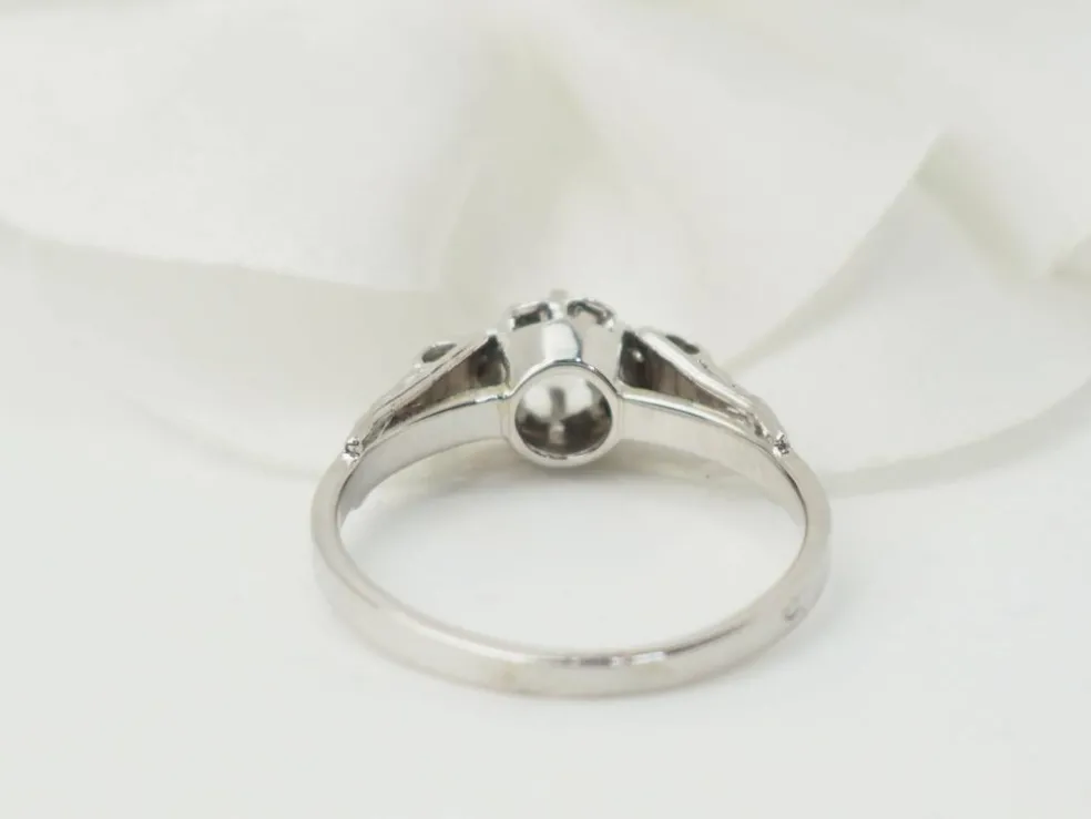 Bague solitaire en or blanc et platine, diamant 0,23ct