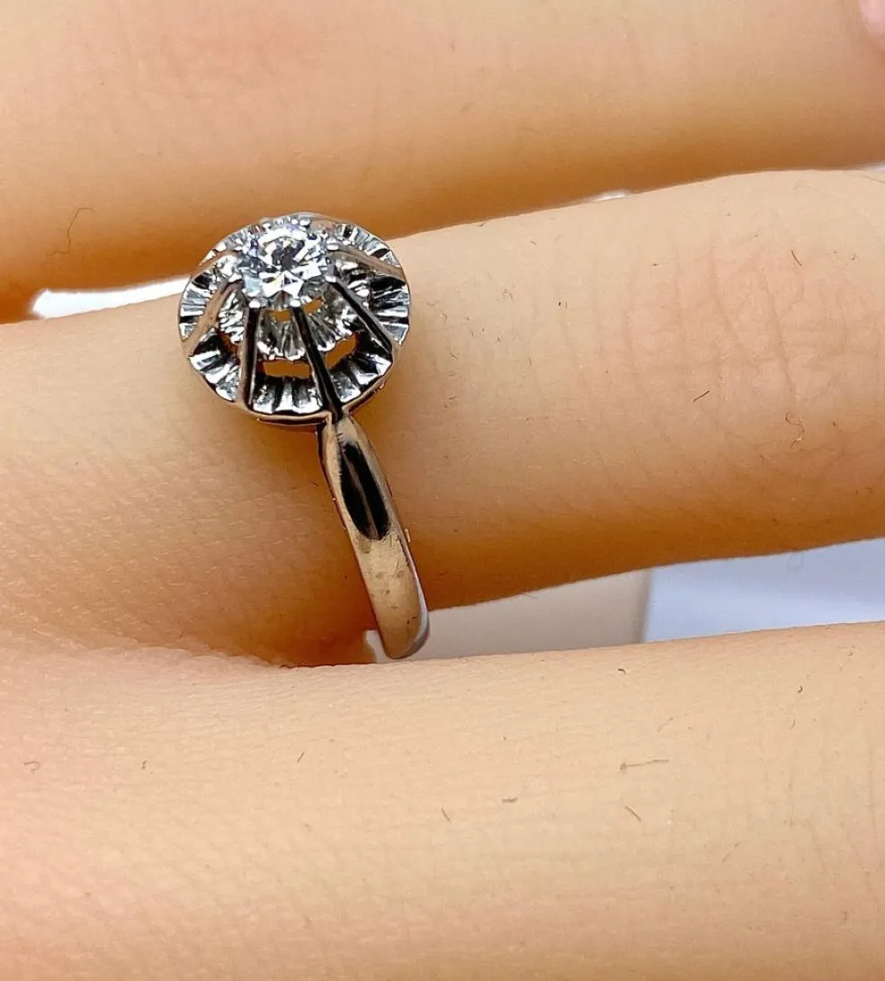 Bague solitaire en or et platine, diamant