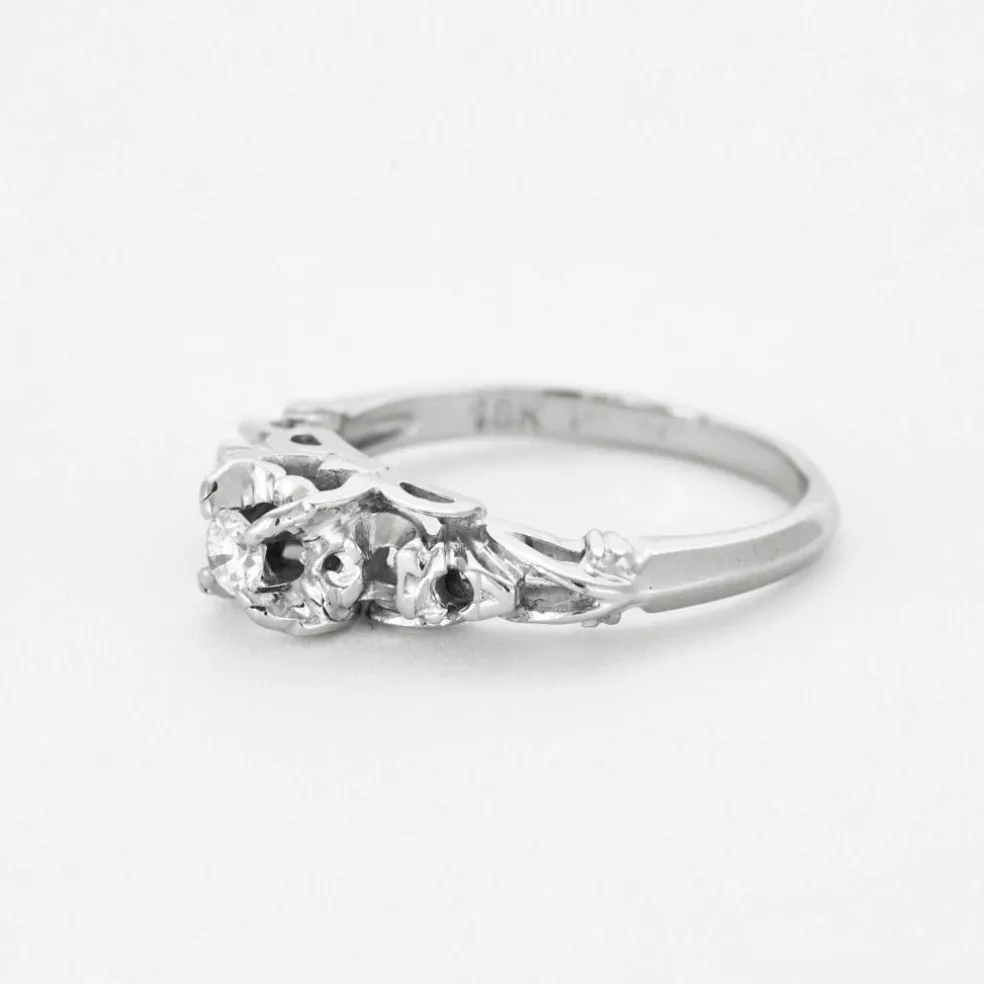 Bague solitaire en or gris