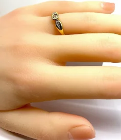 Bague solitaire en or jaune et diamants
