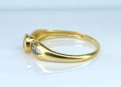 Bague solitaire en or jaune et diamants