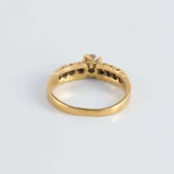 Bague Solitaire épaulé, 9 Diamants