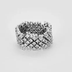Bague souple, or gris et diamants