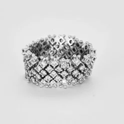 Bague souple, or gris et diamants