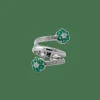 Bague spirale avec diamants et pierres vertes