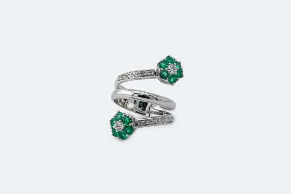 Bague spirale avec diamants et pierres vertes