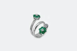 Bague spirale avec diamants et pierres vertes
