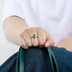 Bague toi et moi, or jaune et émeraudes, épaulées de diamants
