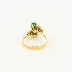Bague toi et moi, or jaune et émeraudes, épaulées de diamants