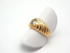 Bague tourbillon godronné en or jaune 750 mil
