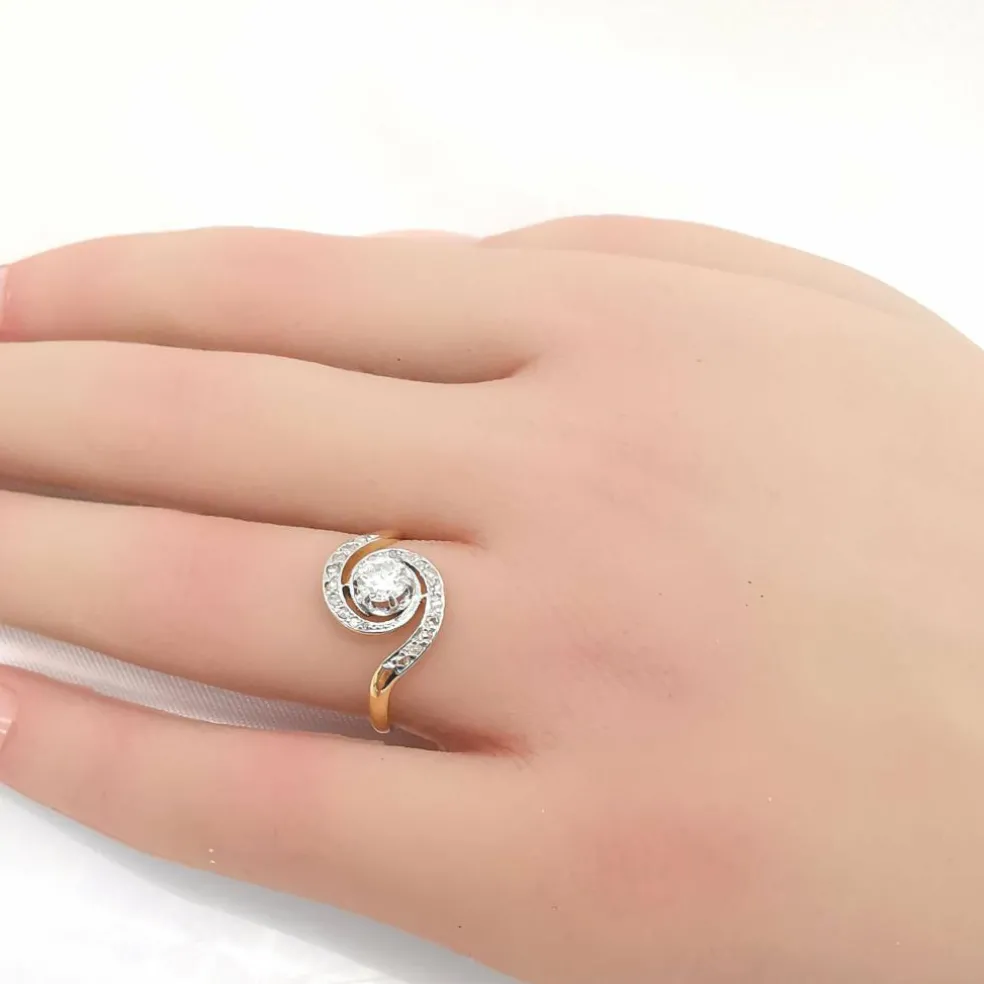 Bague tourbillon or et diamants