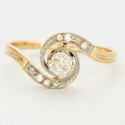 Bague Tourbillon or et diamants