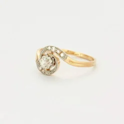 Bague Tourbillon or et diamants