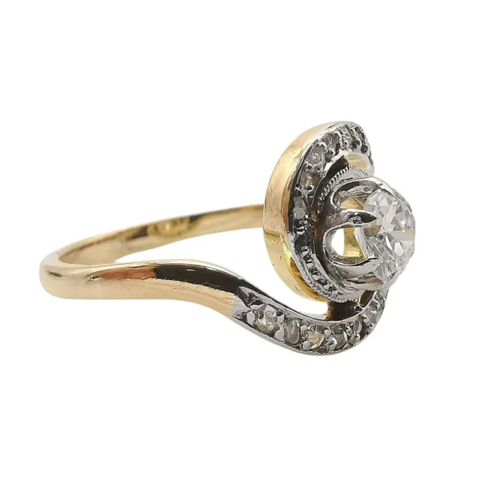 Bague tourbillon or et diamants