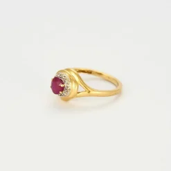 Bague Tourbillon or jaune rubis diamants