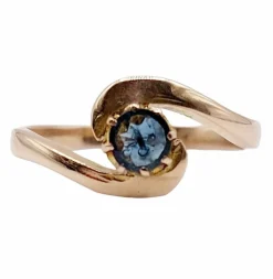 Bague tourbillon or jaune ornée d'un saphir (circa 1920)