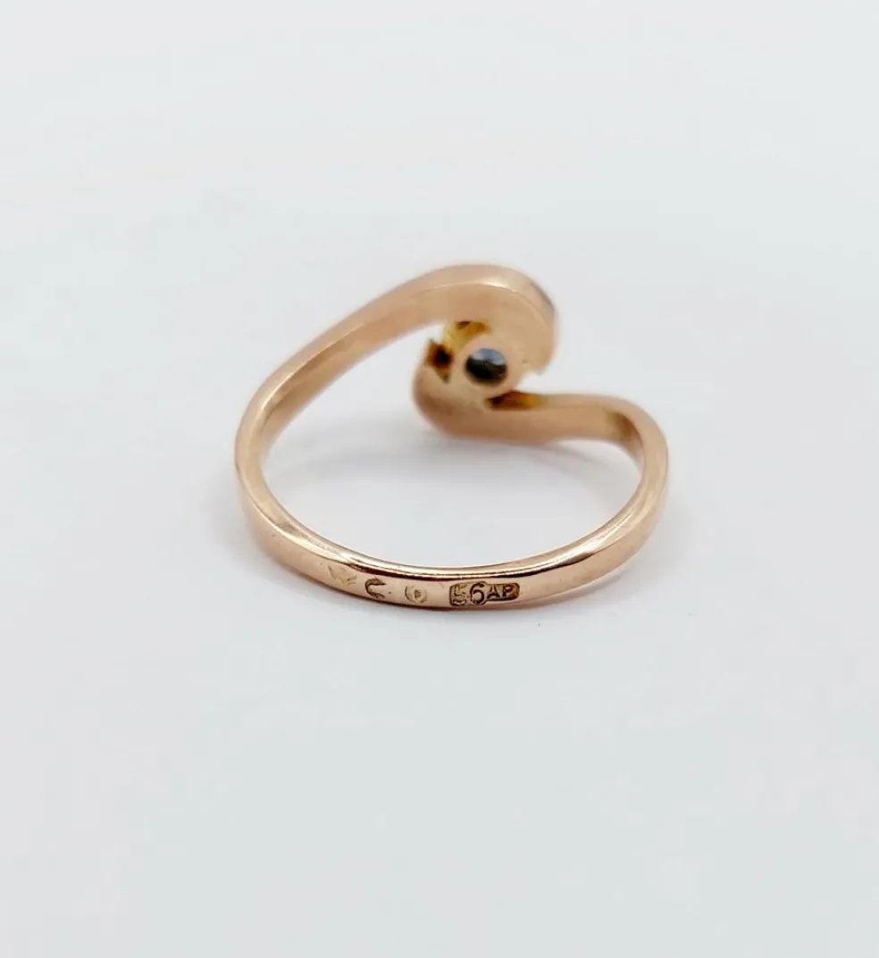Bague tourbillon or jaune ornée d'un saphir (circa 1920)