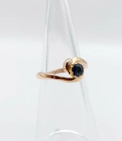 Bague tourbillon or jaune ornée d'un saphir (circa 1920)
