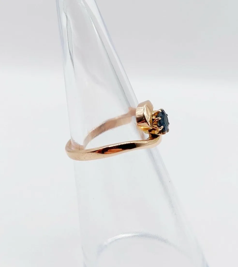 Bague tourbillon or jaune ornée d'un saphir (circa 1920)