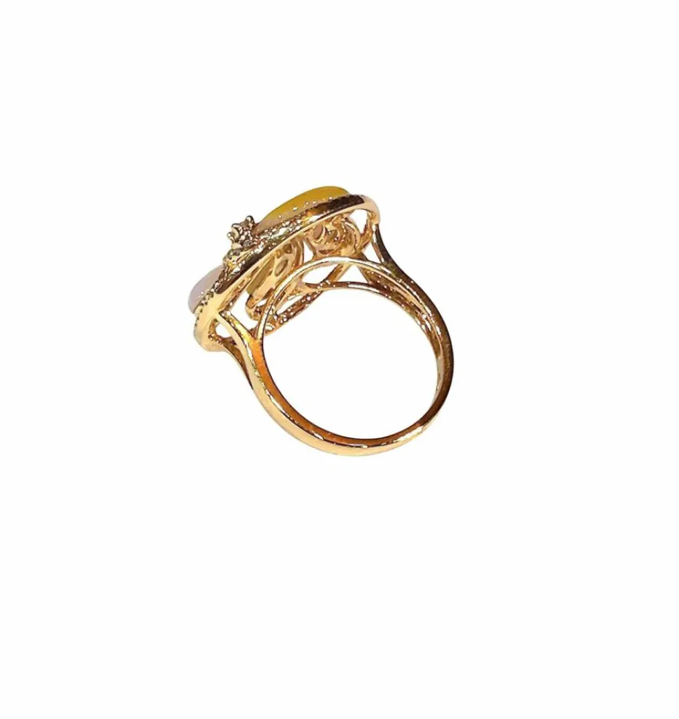Bague tourbillon or rose , jade et diamants