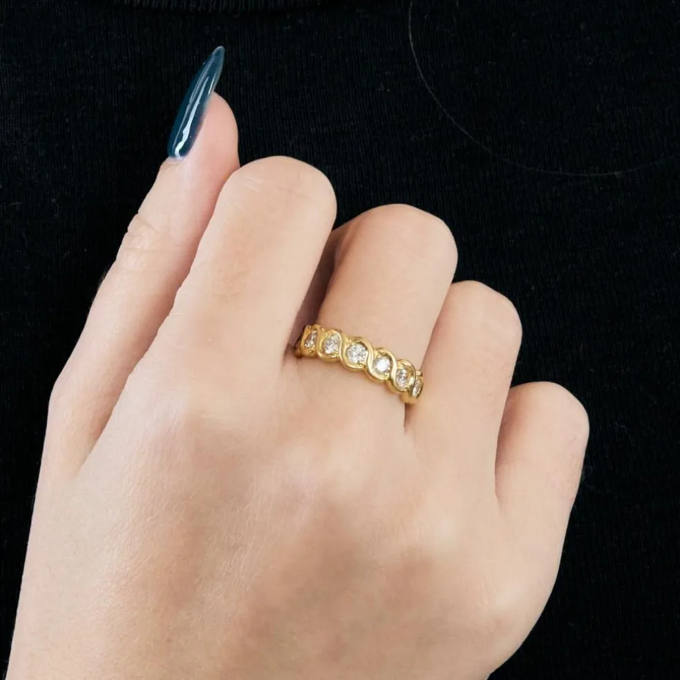Bague tressée or jaune et diamants