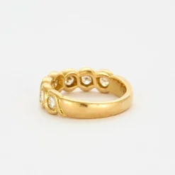 Bague tressée or jaune et diamants
