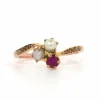 Bague "trilogie" Art Nouveau en or jaune 18 carats sertie de perles et d'un rubis