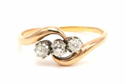 Bague trilogie Art Nouveau en argent et or 18 carats sertie de diamants old-cut